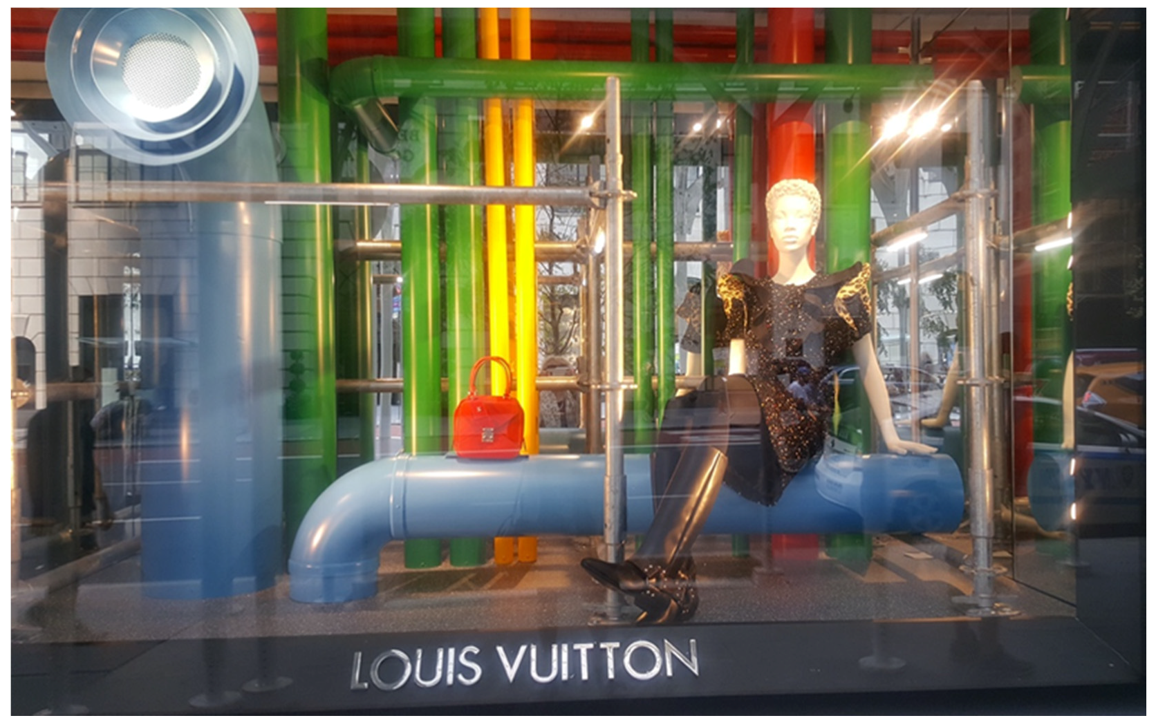 Louis Vuitton's brand history in heritage window displays