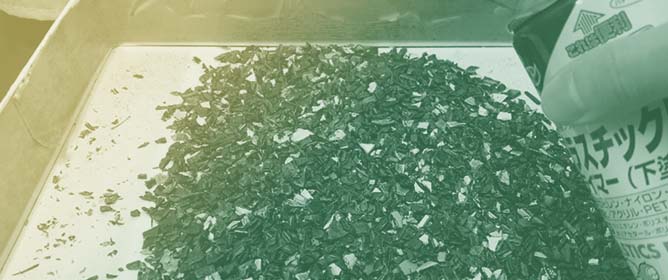 Secondary Treatment Facilitating the Mechanical Recycling of Film-Coated Waste Automobile Bumpers