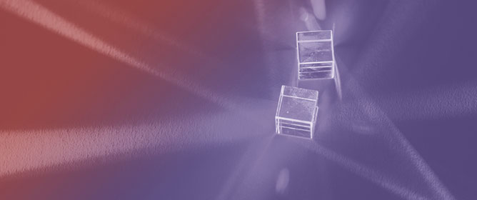 Improved Laser Cooling Efficiencies of Rare-Earth-Doped Semiconductors Using a Photonic-Crystal Nanocavity
