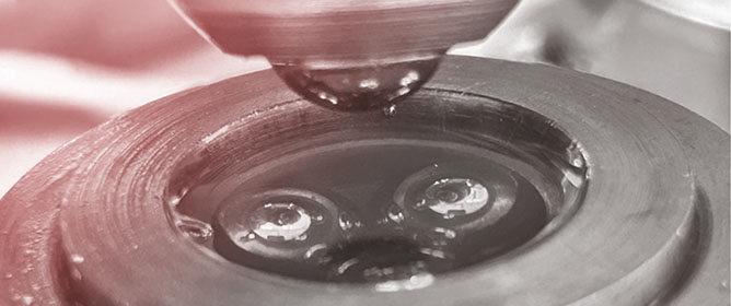 Tribological Performance of SAE 10W-40 Engine Oil Enhanced with Thermally Treated TiO<sub>2</sub> Nanoparticles