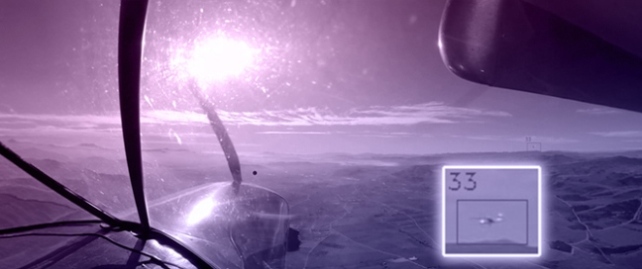 Early Detection of Flying Obstacles Using Optical Flow to Assist the Pilot in Avoiding Mid-Air Collisions