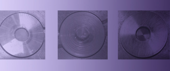 Production and Purification of <sup>165</sup>Er from Pressed Ho<sub>2</sub>O<sub>3</sub>:Al Targets on a 16.5 MeV Cyclotron