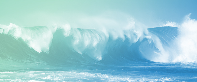 Interaction Between the Longshore Current and the Undertow Induced by the Turbulent Flow in the Surf Zone of Oblique Spilling Breakers