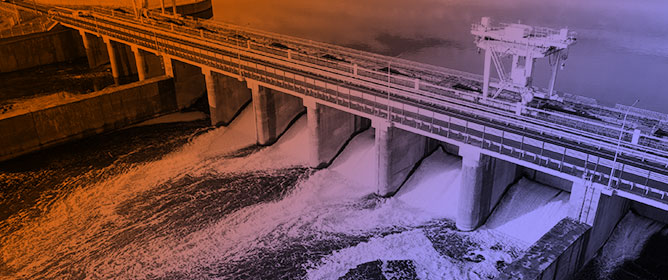 Emerging Reliability Challenges of Spillway Discharging Systems in Aging Hydroelectric Dams