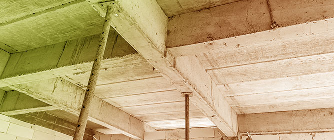 Influence of Curing Methods on Mechanical Properties of Concrete Beams Produced Through Additive Construction Methods